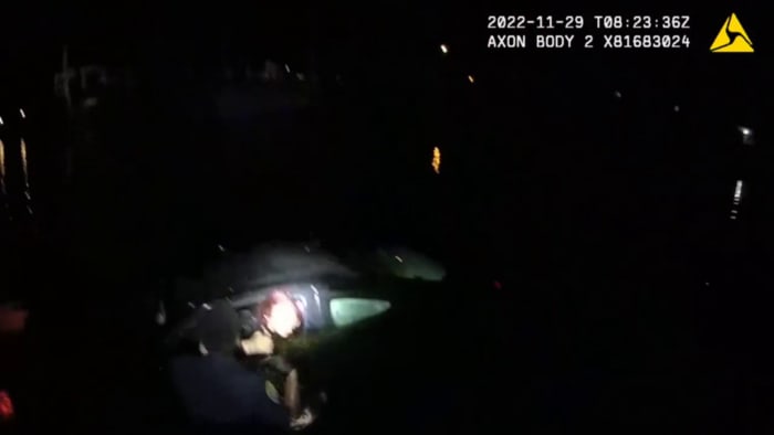 Caught on Camera: Florida officer jumps in canal to save woman trapped in sinking car