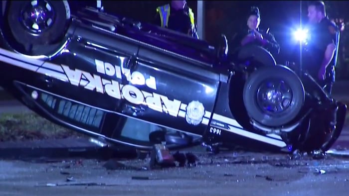 Apopka police cruiser overturns in crash with wrong-way driver on SR-436, FHP says