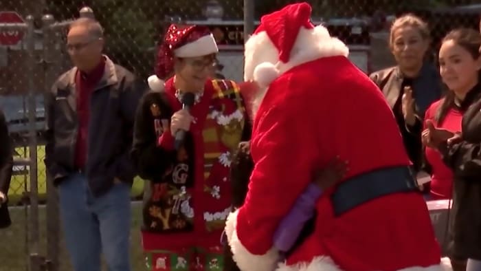 Early holiday gifts provided to 130 Orlando children during giveaway