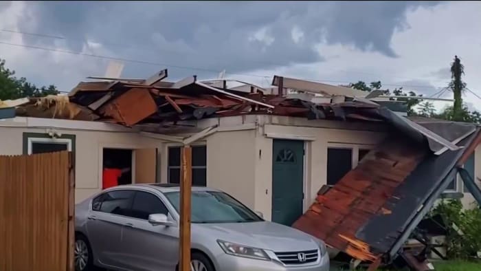 Tornado snaps power poles, damages homes in Melbourne