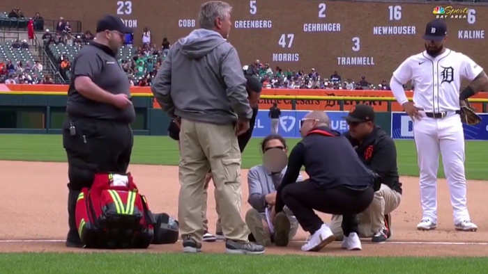 Detroit Tigers groundskeeper flips off camera while being attended to by  medical staff