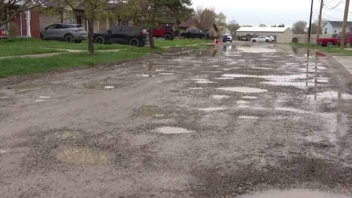 ‘Mess on McLain’: Potholes, flooding on McLain Street leave Lincoln Park residents frustrated