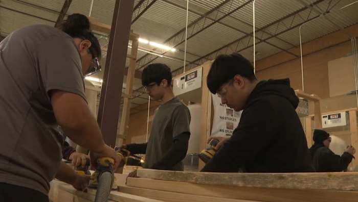 San Antonio ISD students help build 100 twin-size beds for children in need