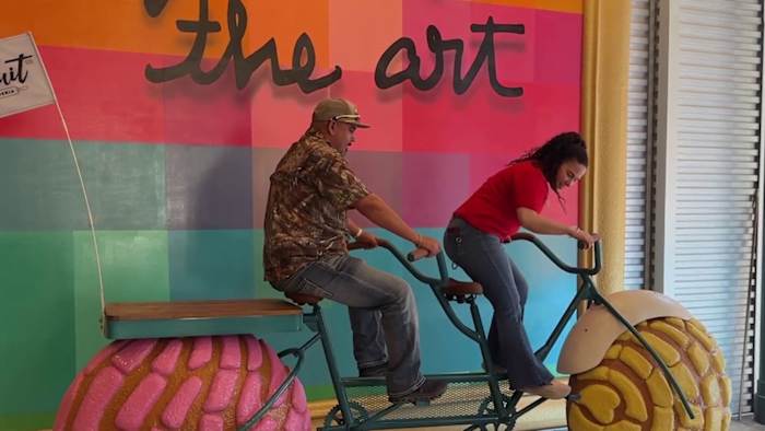 Concha-themed bike installation opens outside River Walk’s Alamo Biscuit restaurant