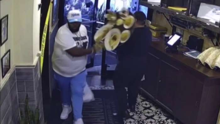 Man caught on video purposely knocking over tray at Miami seafood restaurant