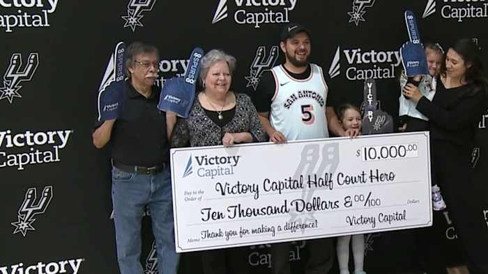 Spurs #39 half court shot contest winner received his $10K check