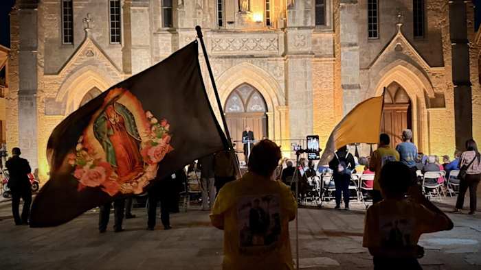 Prayer vigil held downtown for immigrants detained in North Side raid