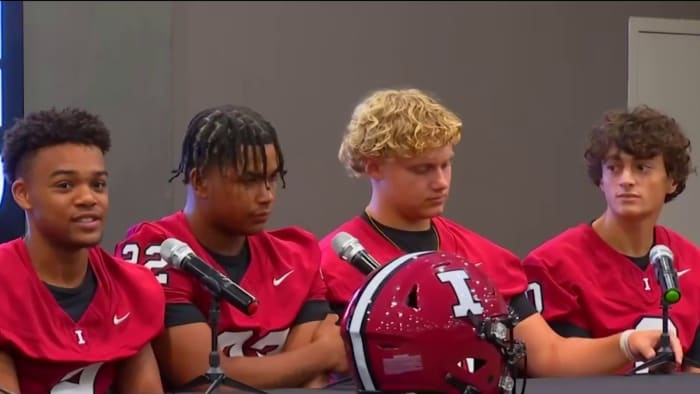 High school football players participate in Florida Citrus Sports media day