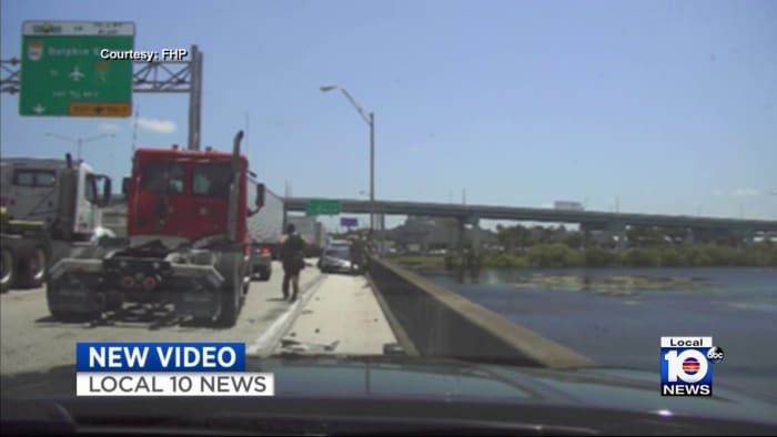 Police: Video shows driver of a stolen car in Miami-Dade jumping from expressway ramp