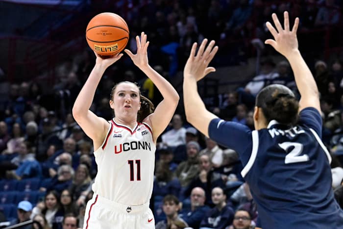 Ziebell leads UConn to 50th consecutive Big East regular-season victory, beating Xavier 97-39