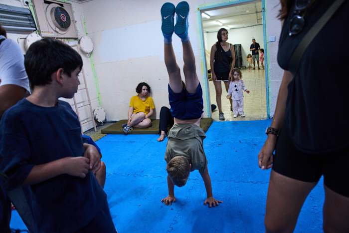 After morning of sirens, Israelis fall back into well-worn w