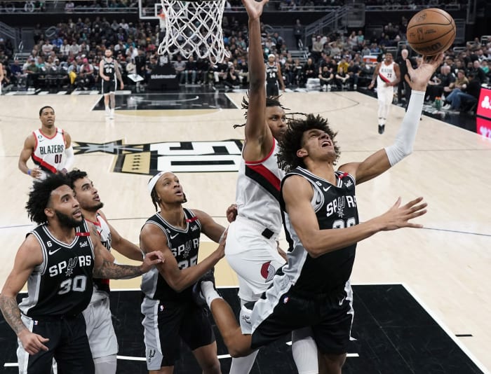 Houston Rockets forward Tari Eason (17) gestures towards San