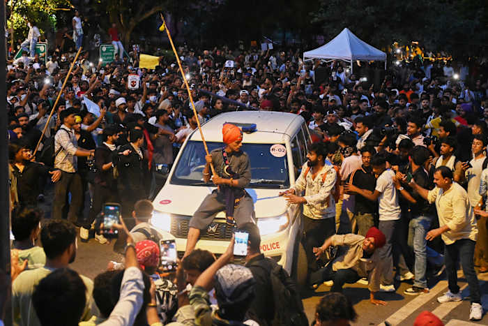 Image linked from the original feed: India protest movement holds capital sit-in as police crack down on demonstrators