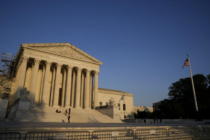 She got $0 from condo sale. Supreme Court weighs fairness