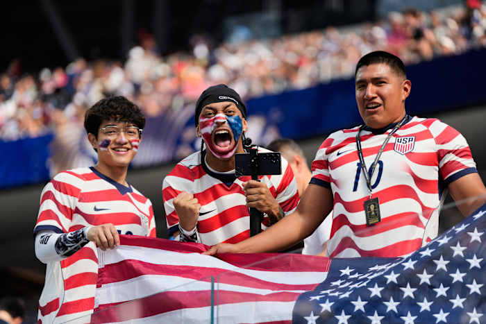 Roaring crowds in stars and stripes show up for the US team, and soccer's moment in their country