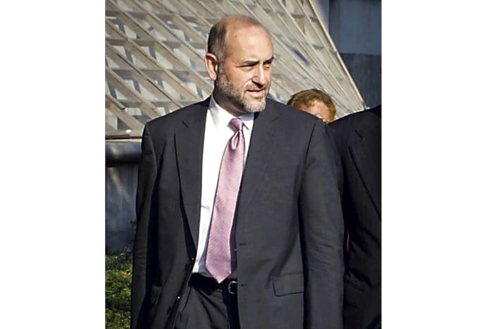 Ex-prosecutor's new book details fight over indicting Trump