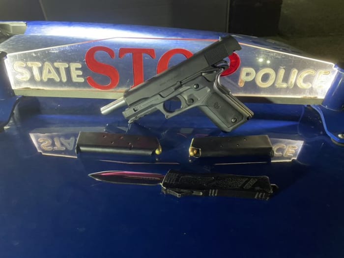 Police find loaded gun, double-edged knife after pulling over Michigan man for equipment violation