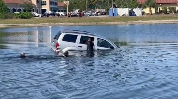 Video shows Longwood police rescue man, 2 dogs from car submerged in retention pond