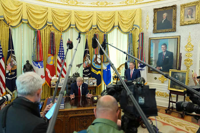 The Latest : Trump envoys are in Qatar for Iran war mediation