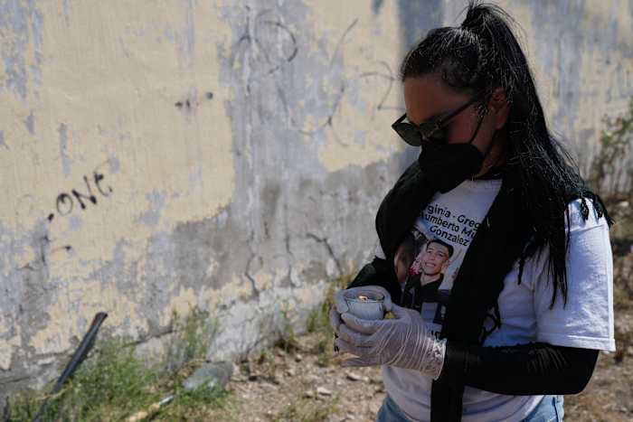 Mexico says a third of 130,000 missing people might be alive, fueling criticism from families