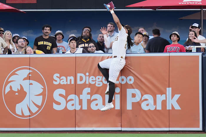 Image linked from the original feed: Tatis makes spectacular catch to rob Devers of a 3-run home run
