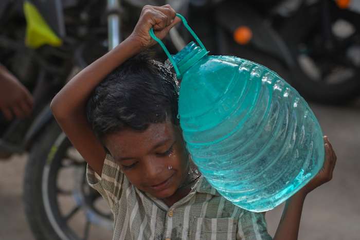 Delayed rains bring water shortages to cities and uncertainty to farms across India