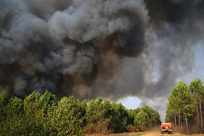 Image linked from the original feed: Tens of thousands of French wildfire evacuees allowed to return home as cooler weather moves in