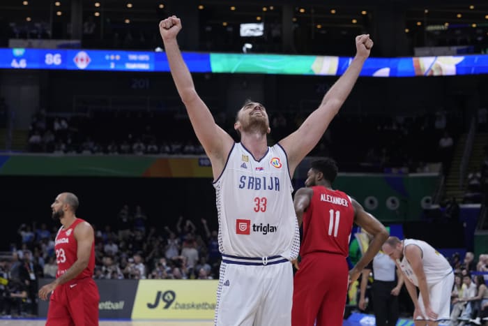 Watch - Nikola Jokic's brothers lift up Michael Malone after reaching NBA  Finals