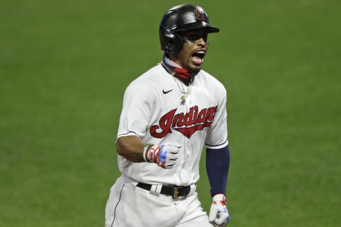 Cleveland Indians' Tyler Naquin runs the bases after hitting a