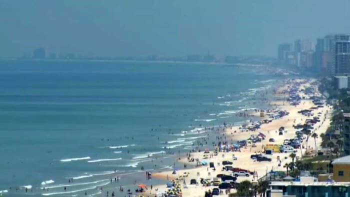 Crazy crowds flock to Daytona Beach, 180 people rescued on Volusia beaches