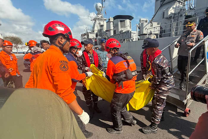 Image linked from the original feed: Unknown number of people are missing after an Indonesian ferry fire killed 5
