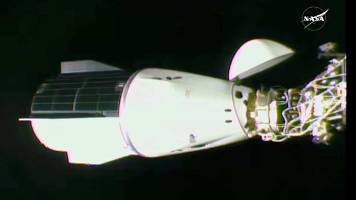 NASA's stuck astronauts welcome their newly arrived replacements to the space station