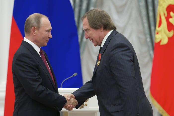4 bankers convicted over Swiss account of longtime Putin pal