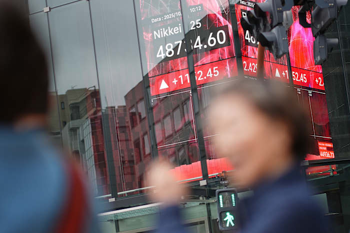 Asian markets extend gains, with Chinese shares up more than 1%, after Wall Street rally