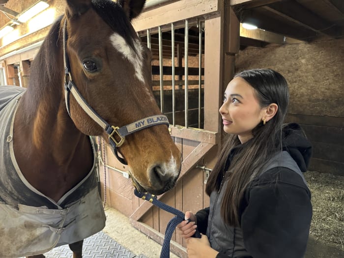 Michigan school shooting survivor heals with surgery, a trusted horse and a chance to tell her story