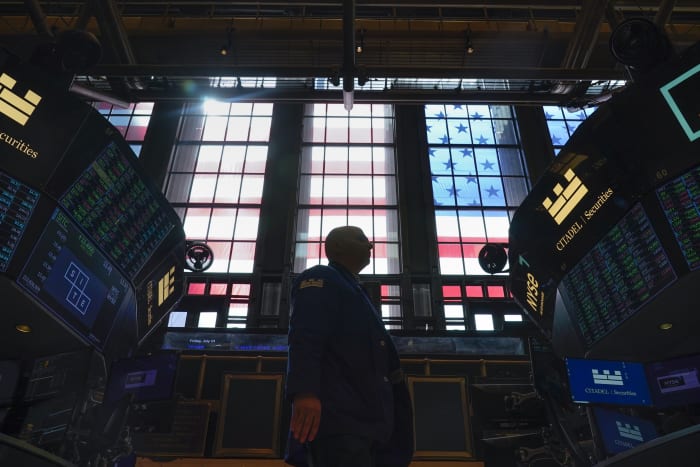 Wall Street clings to modest gains, marks another winning week Wall Street clings to modest gains, marks another winning week