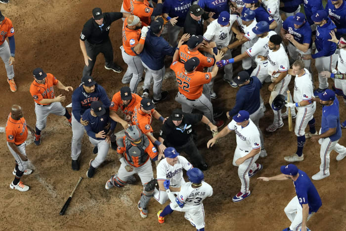 Dodgers edge defending champion Astros 3-2 as LA fans rain down