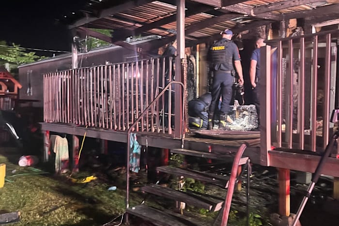 6 people, including 3 children, hospitalized after fire destroys mobile home in Highlands