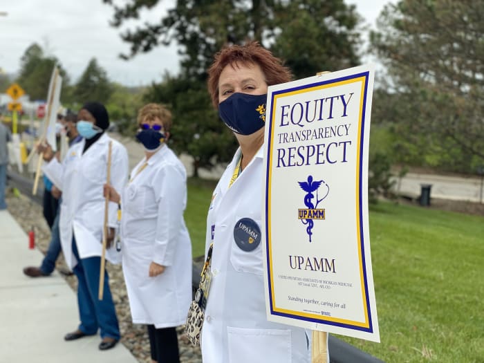 Physician assistants rally in Ann Arbor in support of colleagues