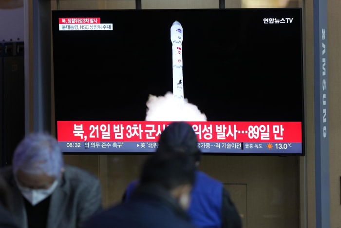 South Korea partially suspends inter-Korean agreement after the North says it launched spy satellite