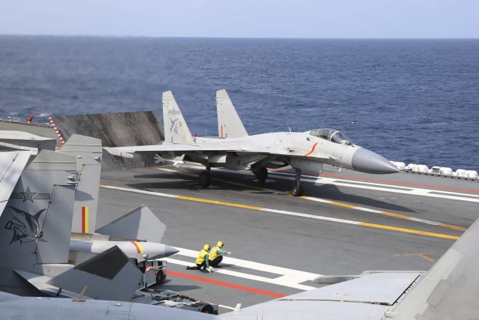 China reaffirms its military threats against Taiwan weeks before the island's presidential election