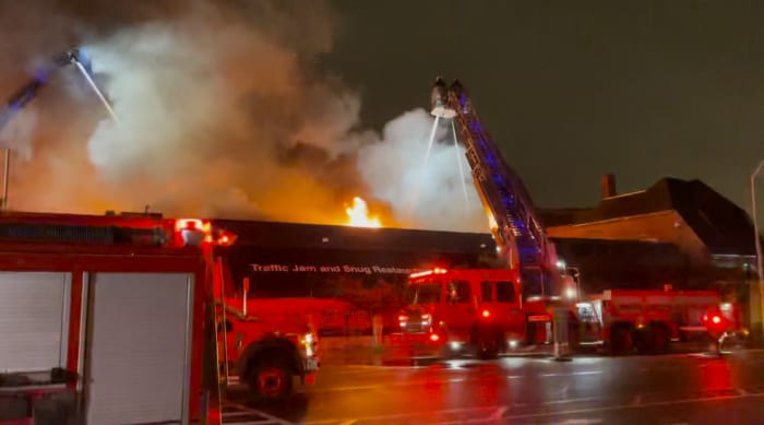 Fire crews fighting fire at Traffic Jam & Snug restaurant in Detroit’s Midtown