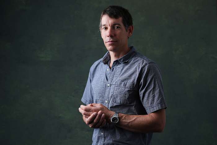 Alex Honnold is climbing Taipei 101 with no ropes, live on TV. It's drawing excitement — and concern