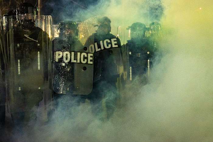 New Jersey police sergeant charged with stealing journalist's camera bag at immigration protest