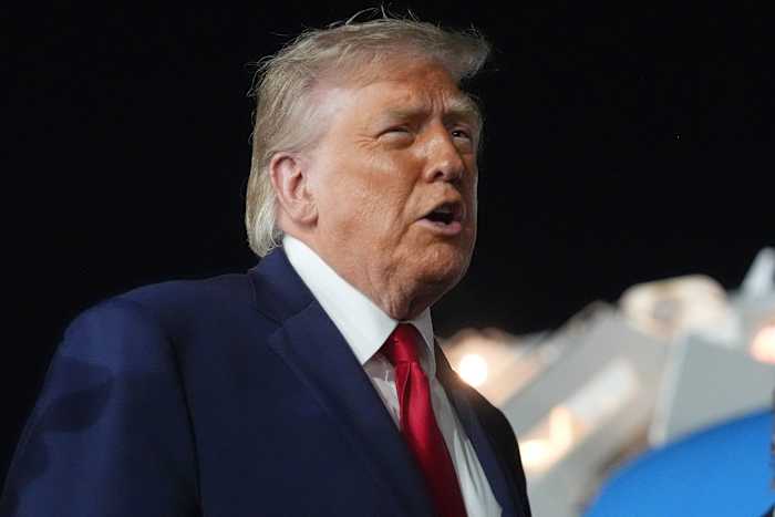 Trump signs bill giving nearly $70B to his immigra