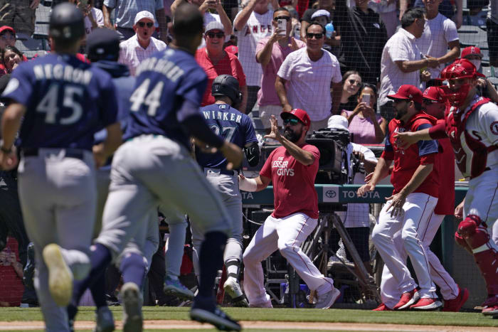 Los Angeles Angels' Mike Moustakas celebrates after hitting a three-run  home run during the seventh inning of a baseball game against the Houston  Astros, Saturday, July 15, 2023, in Anaheim, Calif. (AP