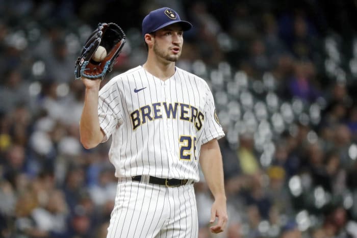 Cain homers, Woodruff pitches Brewers past Giants 6-2 - The San