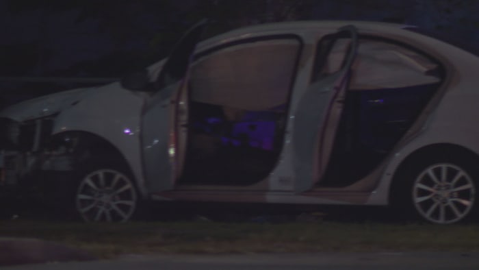 Car shot up in Miami with 2 people inside