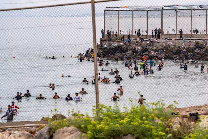 Image linked from the original feed: A 'harsh' first ruling in Morocco after Ceuta surge with 7 taxi drivers jailed, union says
