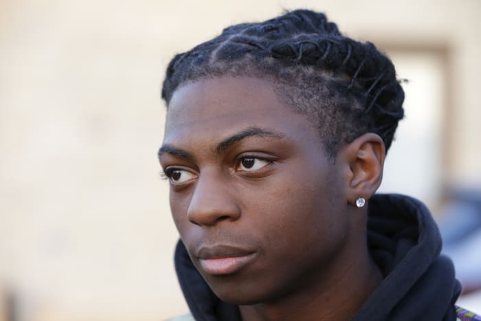 A black student’s family sues Texas officials over his suspension for his hairstyle